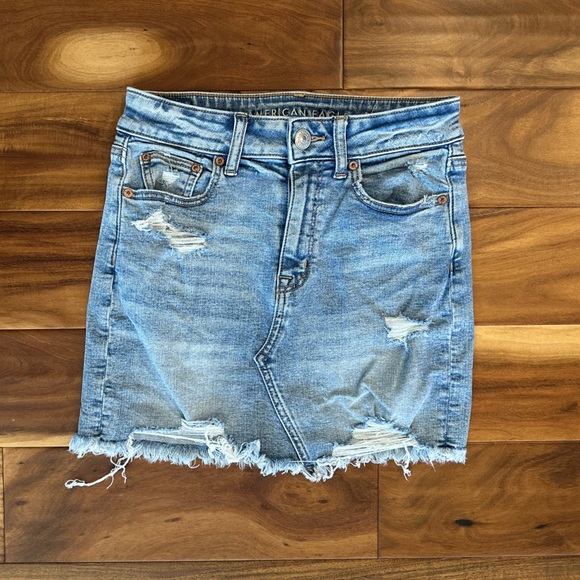 American Eagle Outfitters Dresses & Skirts - American Eagle Distressed Denim Mini Skirt size 4